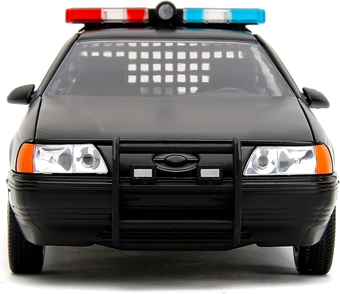 Carro Ford Taurus 1986 con Figura Robocop Esc:1:24 8a+
