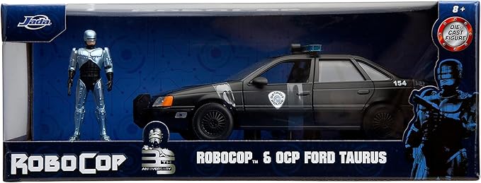 Carro Ford Taurus 1986 con Figura Robocop Esc:1:24 8a+
