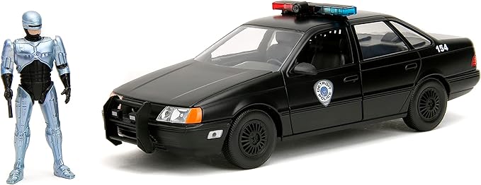 Carro Ford Taurus 1986 con Figura Robocop Esc:1:24 8a+